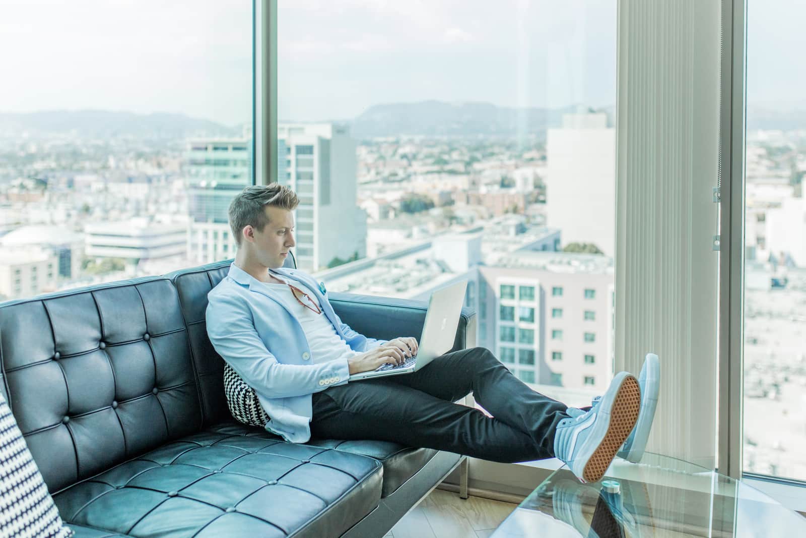 entrepreneur working from home on laptop doing business